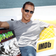 Todd McFarlane with a Spawn book.
